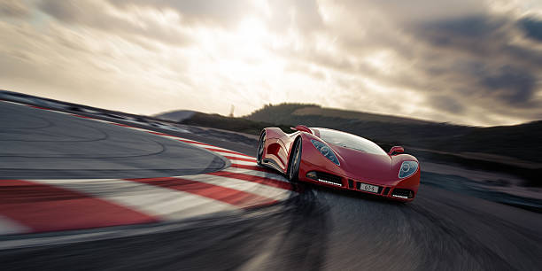 Red sports car on racetrack stock photo