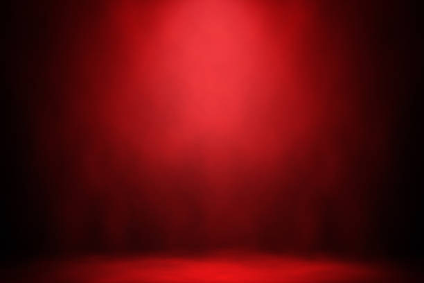 sfondo del palco di fumo riflettore rosso. - red spotlight foto e immagini stock