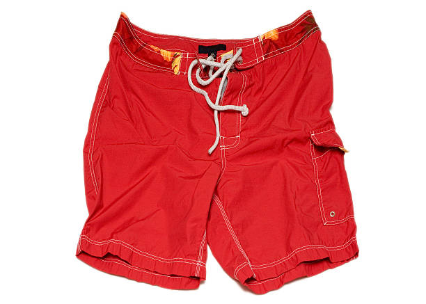 Red Swimming Shorts Trunks (isolated, clipping path) stock photo