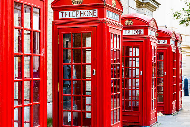 Red Telephone Booths The iconic red telephone booths on Broad Court, Covent Garden, London red telephone box stock pictures, royalty-free photos & images