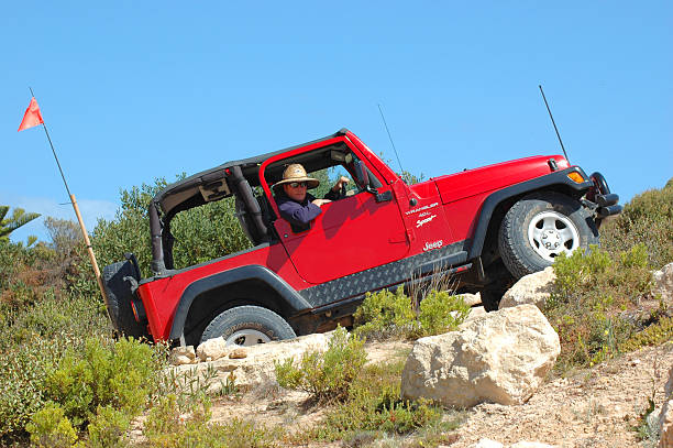 Red TJ Jeep Wrangler between Robe and Beachport, South Australia stock photo