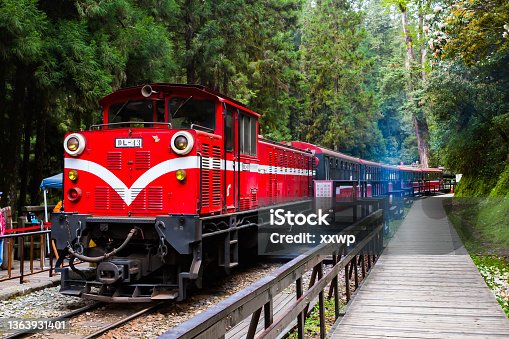 istock Red train head, train station in the mountains, small train in the mountains. 1363931401