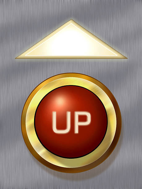 Red up button with lit arrow for elevator stock photo