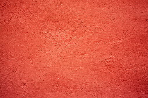 Red wall texture and background.