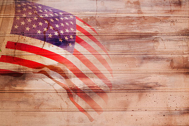 Red, white and blue American flag on rustic background. Red, white, and blue American flag overlayed onto a rustic wooden board background.  No people.  Symbolic of various holidays: Memorial Day, Veteran's Day, July 4th, Sept. 11.  Many concepts: patriotism, respect, honor, freedom, heroes, serivce, country, voting, dedication. memorial day background stock pictures, royalty-free photos & images