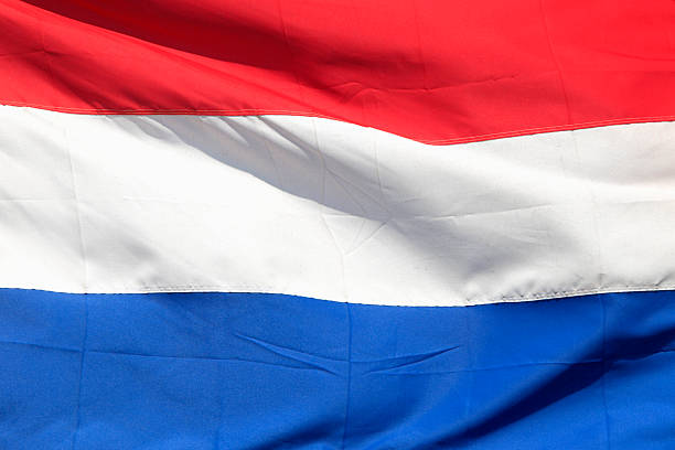 nationalflagge der niederlande - holländische flagge stock-fotos und bilder