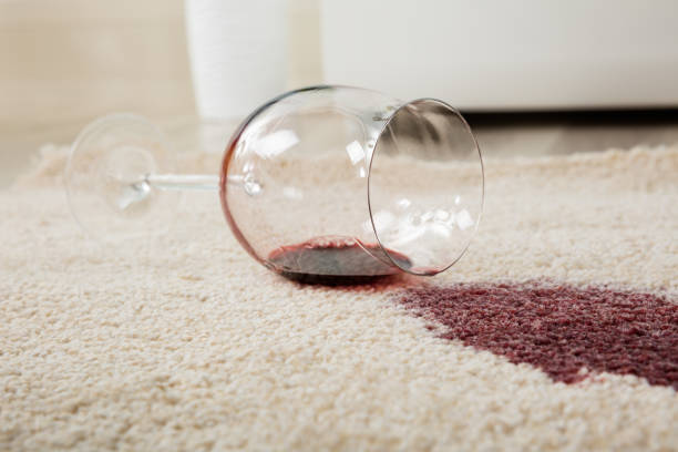 Red Wine Spilled From Glass On Carpet High Angle View Of Red Wine Spilled From Glass On Carpet stained stock pictures, royalty-free photos & images