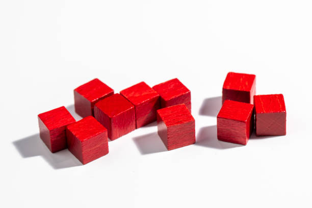 Red Wooden Game Cubes on White Background stock photo