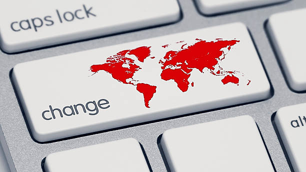 Red World Change Keyboard Button An extreme close-up of a keyboard, focused on the shift key which now says "change" and has a red map of the world. impact stock pictures, royalty-free photos & images