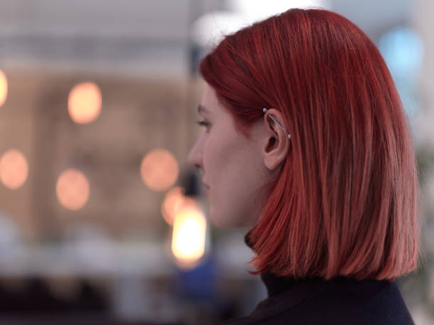 redhead business woman portrait in creative modern coworking startup open space office stock photo