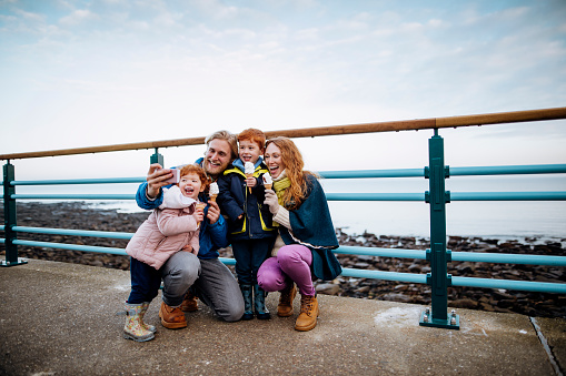 Redhead Family Taking a Selfie at the Coast