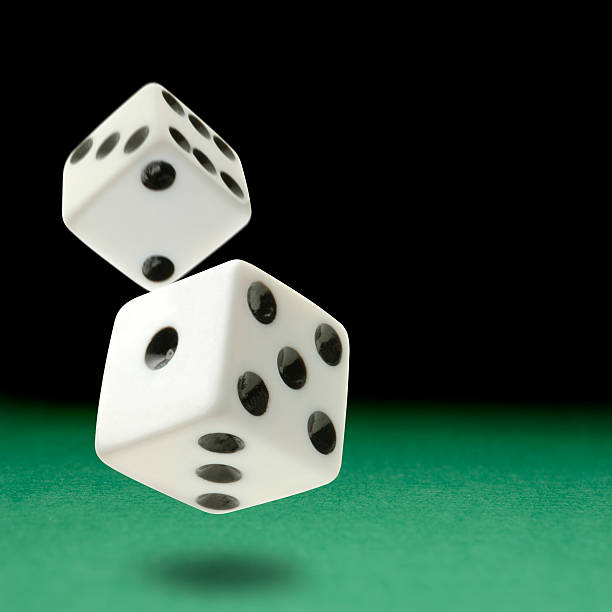 Reentry Dice Flying on Craps Table. reentry stock pictures, royalty-free photos & images