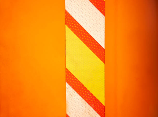 Reflector tape on traffic barrier. stock photo