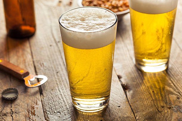 Refreshing Summer Pint of Beer Refreshing Summer Pint of Beer Ready to Drink pint glass stock pictures, royalty-free photos & images