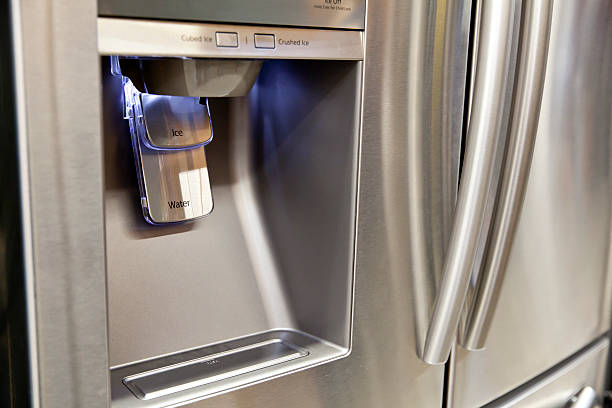 Refrigerator Ice and Water Dispenser stock photo