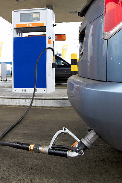 Refueling a car at LPG gas station stock photo