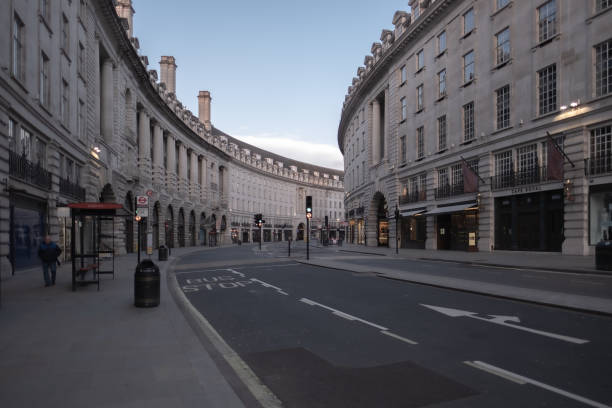 Regent Street - Central London lockdown due to the epidemic London, UK - March 21, 2020: Usually crowded Regent Street shopping during the corona virus epidemic of 2020 central london stock pictures, royalty-free photos & images
