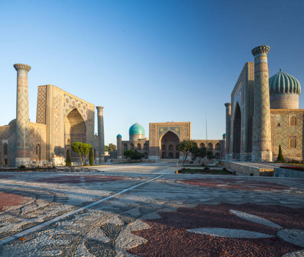 Registan in the city of Samarkand Registan square in the city of Samarkand at sunrise, Uzbekistan samarkand stock pictures, royalty-free photos & images
