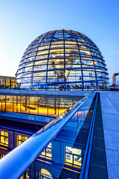 Reichstag dome in Berlin at dusk Reichstag dome, part of Reichstag, building of German parliament in Berlin. cupola stock pictures, royalty-free photos & images