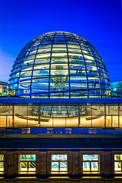 Reichstag dome in Berlin at dusk Reichstag dome, part of Reichstag, building of German parliament in Berlin. cupola stock pictures, royalty-free photos & images