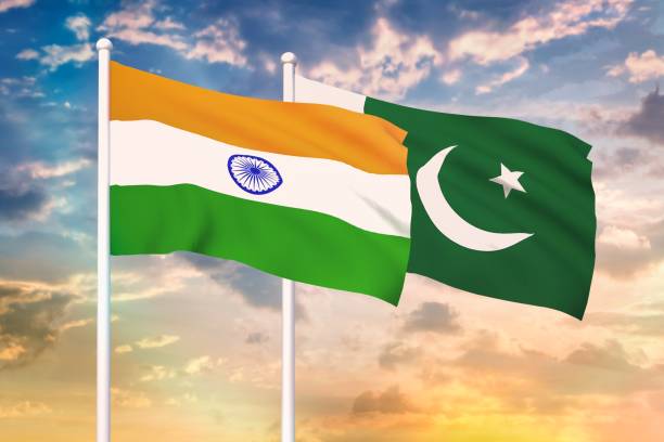 Relationship between the India and the Pakistan Relationship between the India and the Pakistan. Two flags of countries on heaven with sunset. 3D rendered illustration. pakistani flag stock pictures, royalty-free photos & images