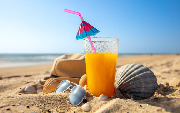 relaxing cocktail on the beach stock photo