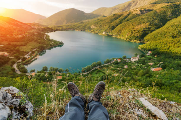 Relaxing in mountain Relaxing time during an outdoor trekking in Abruzzo, Scanno Lake or better Heart Lake adirondack state park stock pictures, royalty-free photos & images