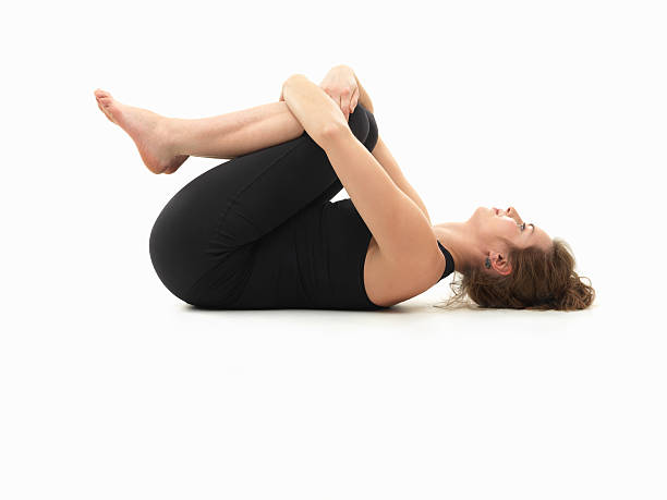 relaxing yoga pose caucasian woman on the floor