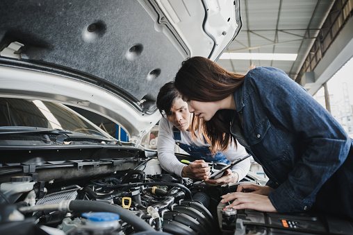 Reliable Auto Mechanics >> Reliable Auto Mechanic Talking To A Female Customer The Reliable Auto Mechanics >> Reliable Auto Mechanic Talking To A Female Customer The