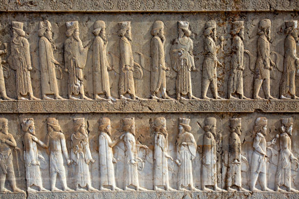Reliefs in the ancient Persian city of Persepolis near Shiraz, Iran Antique reliefs in Persepolis, Shiraz, Iran sumerian civilization stock pictures, royalty-free photos & images
