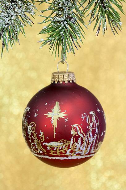 Religious: Christmas Nativity Scene on red Ornament stock photo