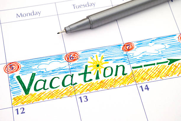 Reminder Vacation in calendar Reminder Vacation in calendar with pen holiday calendars stock pictures, royalty-free photos & images