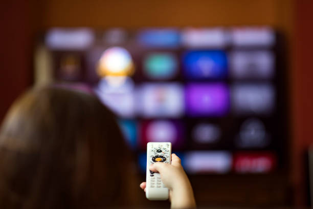 Remote control with smart tv stock photo