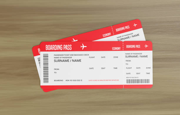 3D Render 2 Airline Boarding Pass Tickets on the wooden table. stock photo