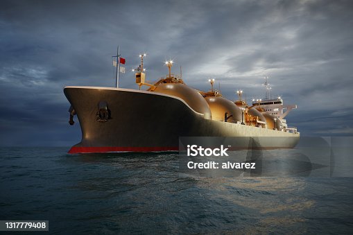 istock 3D rendering of LNG tanker sailing in sea at night 1317779408