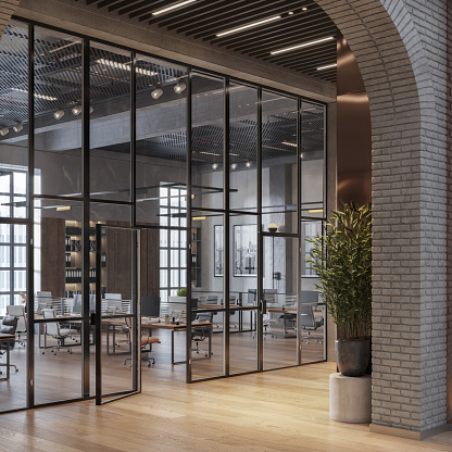 3D rendering of a modern empty office with large glass partitions. Digitally generated image of spacious open plan office space.