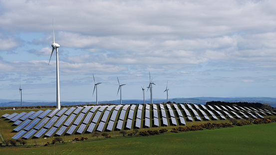 Renewable Energy farm with Solar Panels & Wind Turbines.