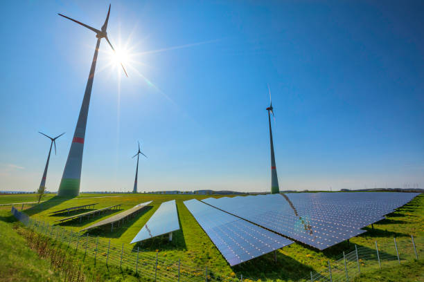 förnybar energi: vindkraftverk och moderna solpaneler (hdri) - wind and solar energy bildbanksfoton och bilder