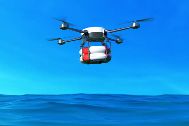 aeronave de resgate com lifebuoy sobrevoando o oceano. - drone sobrevoando o mar - fotografias e filmes do acervo