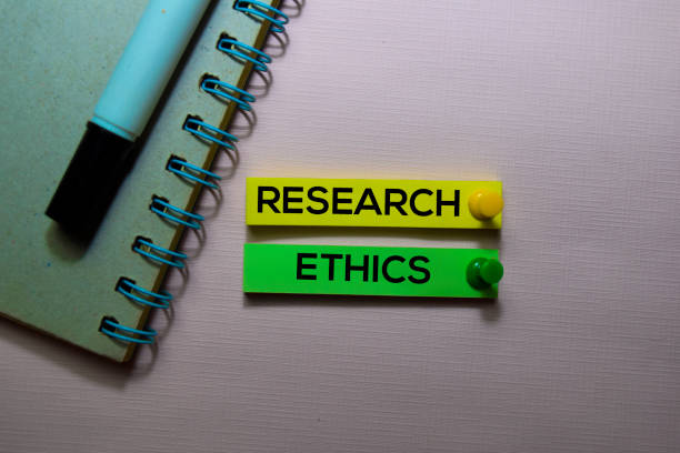 Research Ethics text on sticky notes isolated on office desk stock photo
