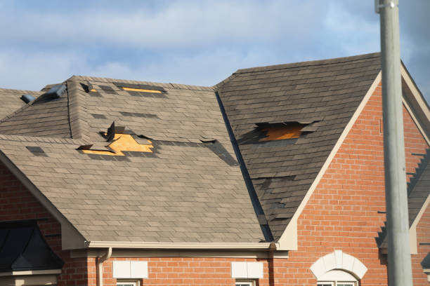 Residential house roof after devastating winds stock photo