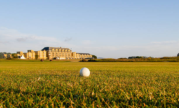 Resort hotel at the historic Saint Andrews golf course Scotland. St Andrews,Scotland, United Kingdom - June 26, 2009: Resort hotel in the distance at the historic Saint Andrews golf course in Scotland. 2009 stock pictures, royalty-free photos & images