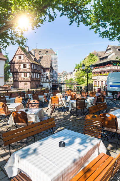 Restaurant in Petite France in Strasbourg Petite France in Strasbourg petite france strasbourg stock pictures, royalty-free photos & images