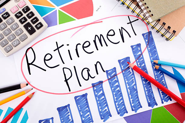 Retirement plan The words Retirement Plan written on a hand drawn bar chart surrounded by pencils, books and calculator.   Alternative version shown below: 401k stock pictures, royalty-free photos & images