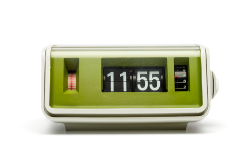 Original 70th flip clock isolated on white.More like this:
