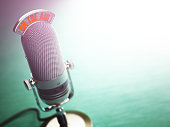 istock Retro old microphone with text on the air. Radio show 618743630