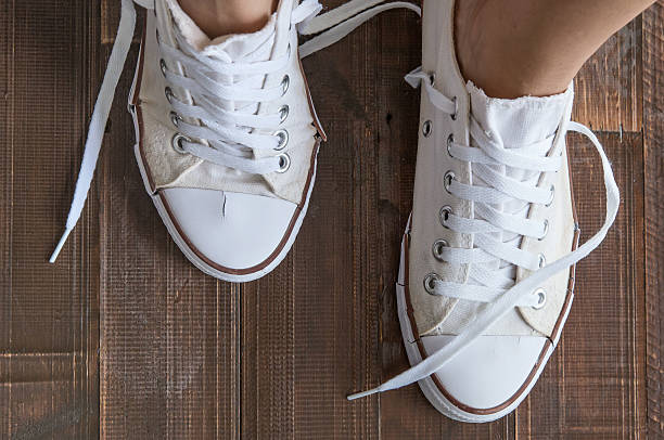Untied Shoes Stock Photos, Pictures & Royalty-Free Images - iStock