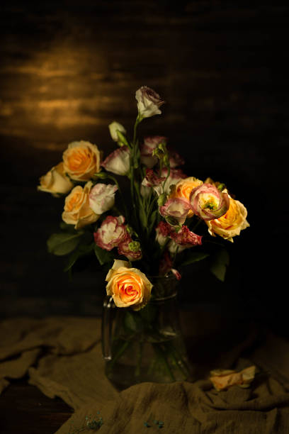 retro-style still life: flower and vase, studio shot stock photo