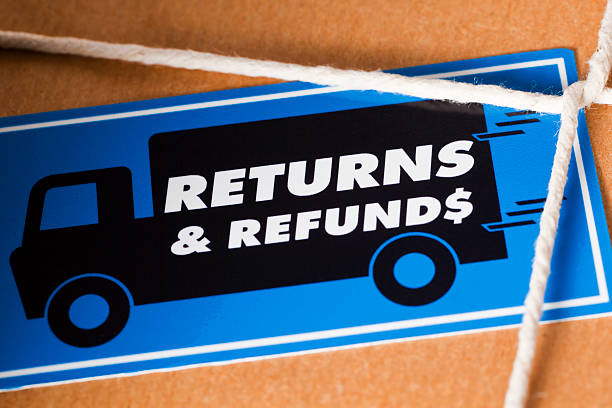 Return and Refund Package US Dollar Return the goods by a courier for a Dollar Refund. Close up of a brown paper parcel, tied with string and a Return & Refunds sticker. returning stock pictures, royalty-free photos & images