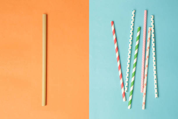 Reusable bamboo straws as an alternative for single-use plastic straws Reusable bamboo straws as an alternative for single-use plastic straws straw stock pictures, royalty-free photos & images